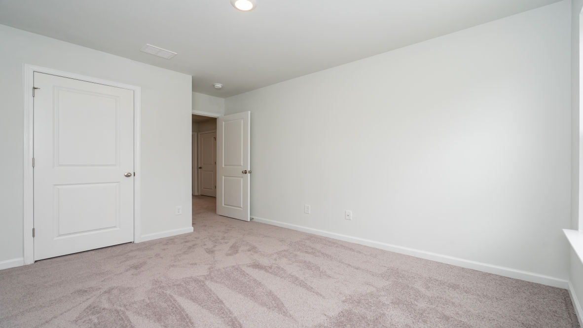 The primary bedroom is a perfect retreat with a walk-in closet and generous primary bathroom featuring a double vanity, large shower, and a separate linen closet. Plus, the laundry room is on the second floor with all the bedrooms!