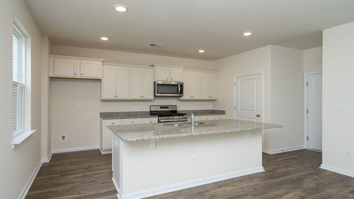 The living area is an open concept, where your kitchen, living, and dining areas blend seamlessly into a space perfect for everyday living and entertaining.