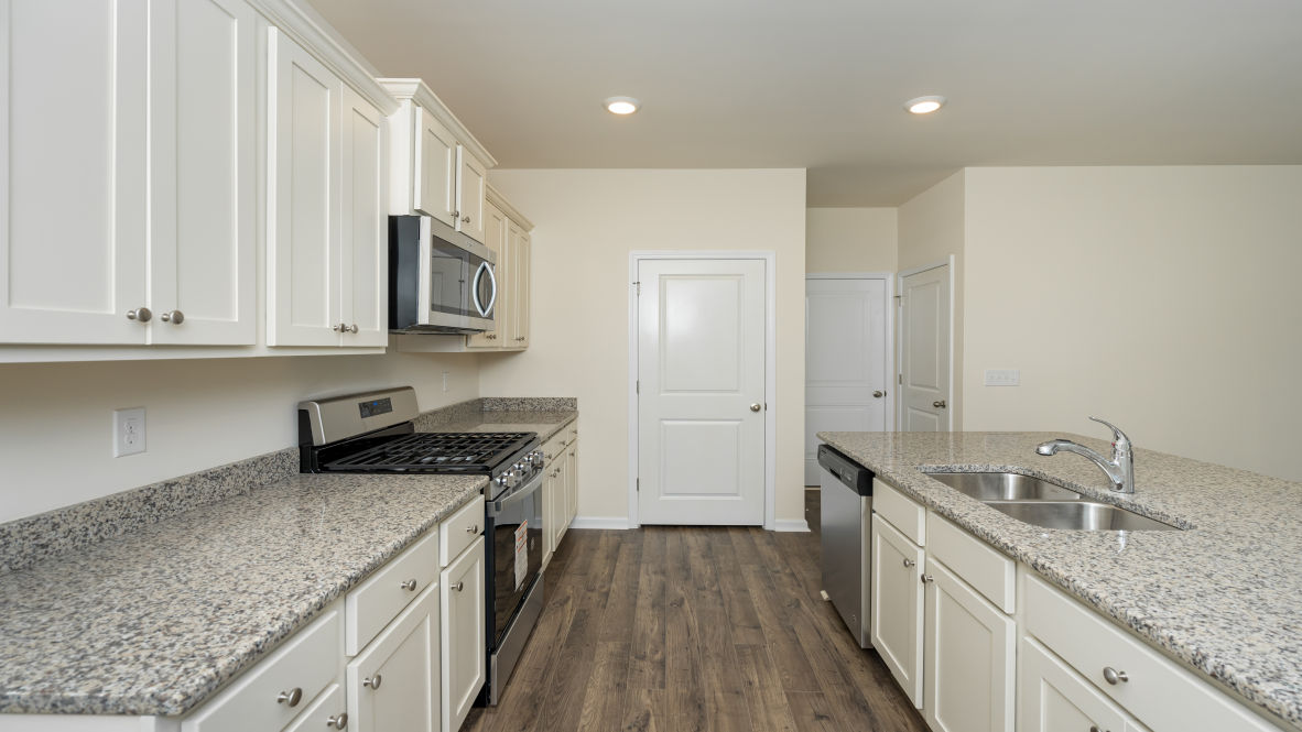 The living area is an open concept, where your kitchen, living, and dining areas blend seamlessly into a space perfect for everyday living and entertaining.