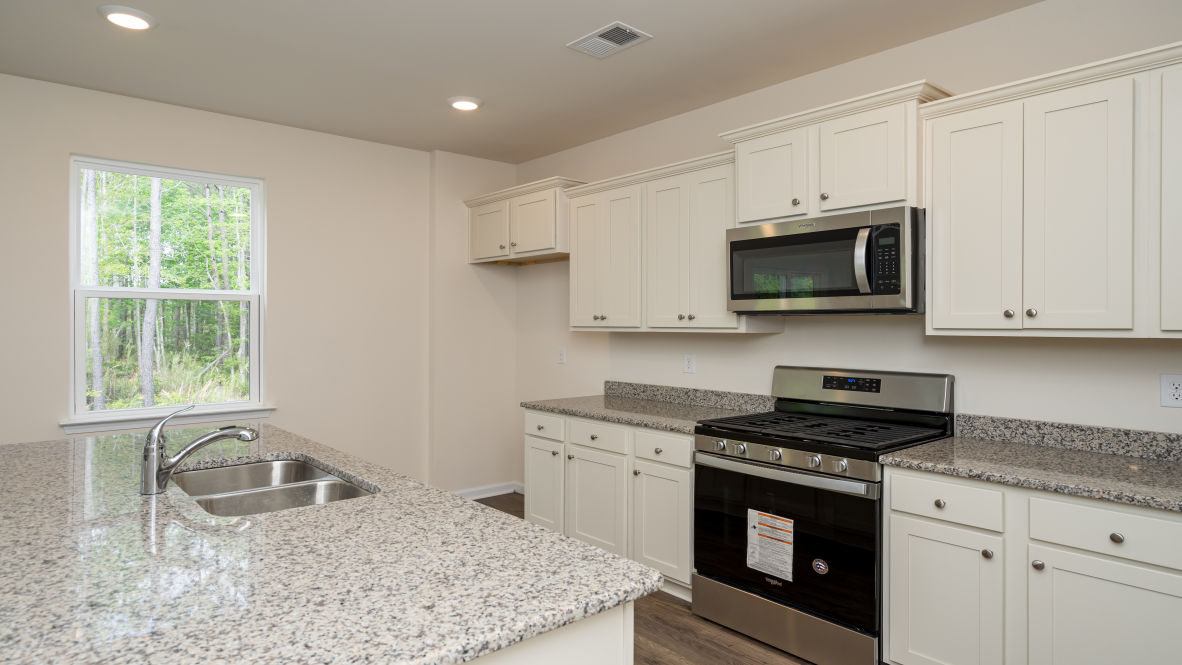 The living area is an open concept, where your kitchen, living, and dining areas blend seamlessly into a space perfect for everyday living and entertaining.