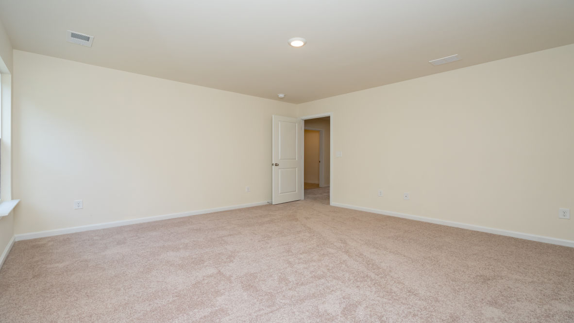 The primary bedroom is a perfect retreat with a walk-in closet and generous primary bathroom featuring a double vanity, large shower, and a separate linen closet. Plus, the laundry room is on the second floor with all the bedrooms!