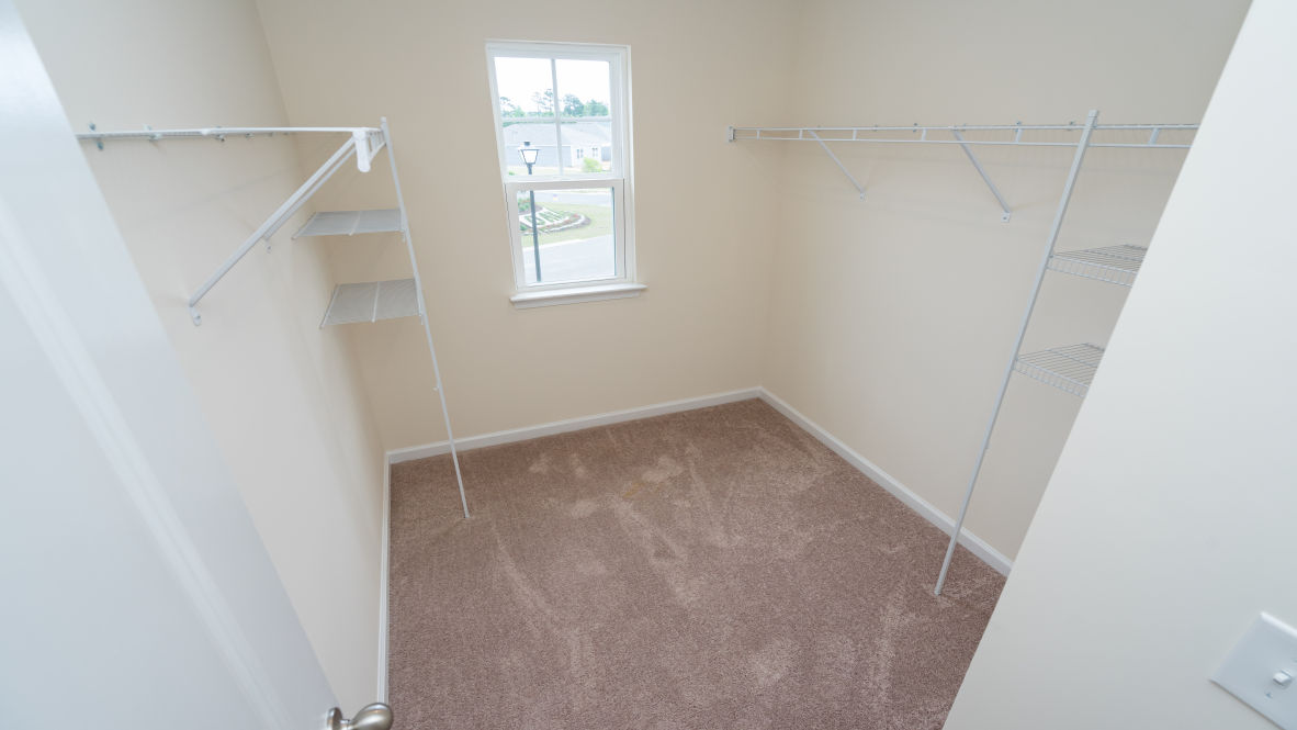 The primary bedroom is a perfect retreat with a walk-in closet and generous primary bathroom featuring a double vanity, large shower, and a separate linen closet. Plus, the laundry room is on the second floor with all the bedrooms!