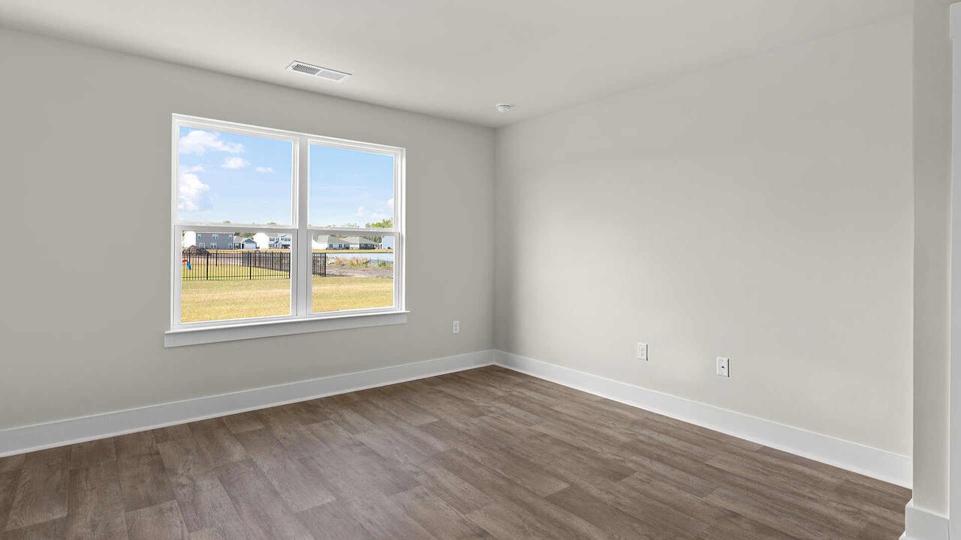 This is a 4-bedroom, 2.5-bathroom home with a 2-car garage, and it has the primary suite on the main level.