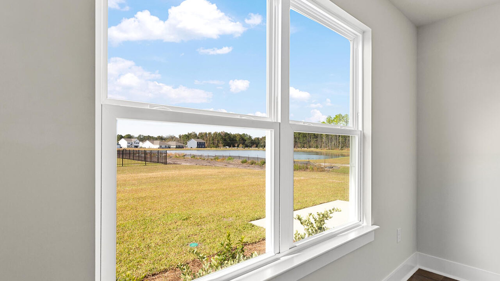 This is a 4-bedroom, 2.5-bathroom home with a 2-car garage, and it has the primary suite on the main level.