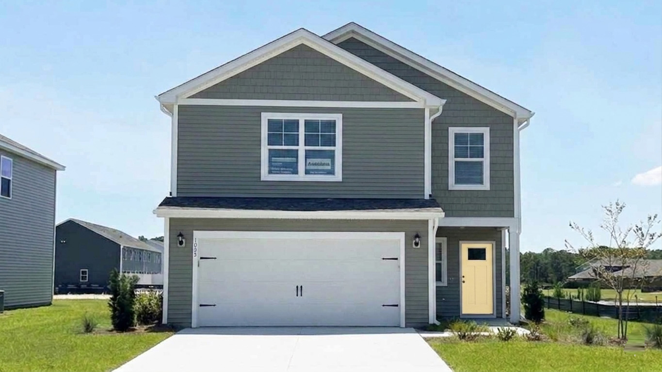 This is a 4-bedroom, 2.5-bathroom home with a 2-car garage, and it has the primary suite on the main level.