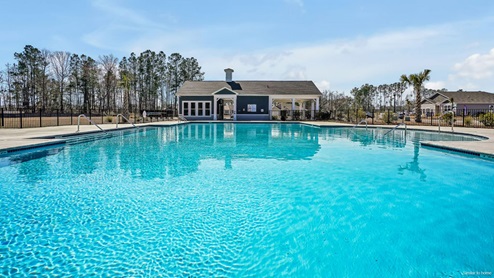 New Homes in Bolivia NC. Amenities include a pool, an amenity building, an exercise fitness room, and a fire pit.