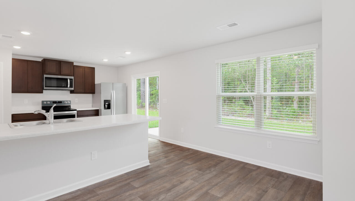 The heart of the home is the kitchen granite counters, a large peninsula island with room for 4 counter height barstools. The stainless-steel appliances, microwave, dishwasher and single bowl sink.