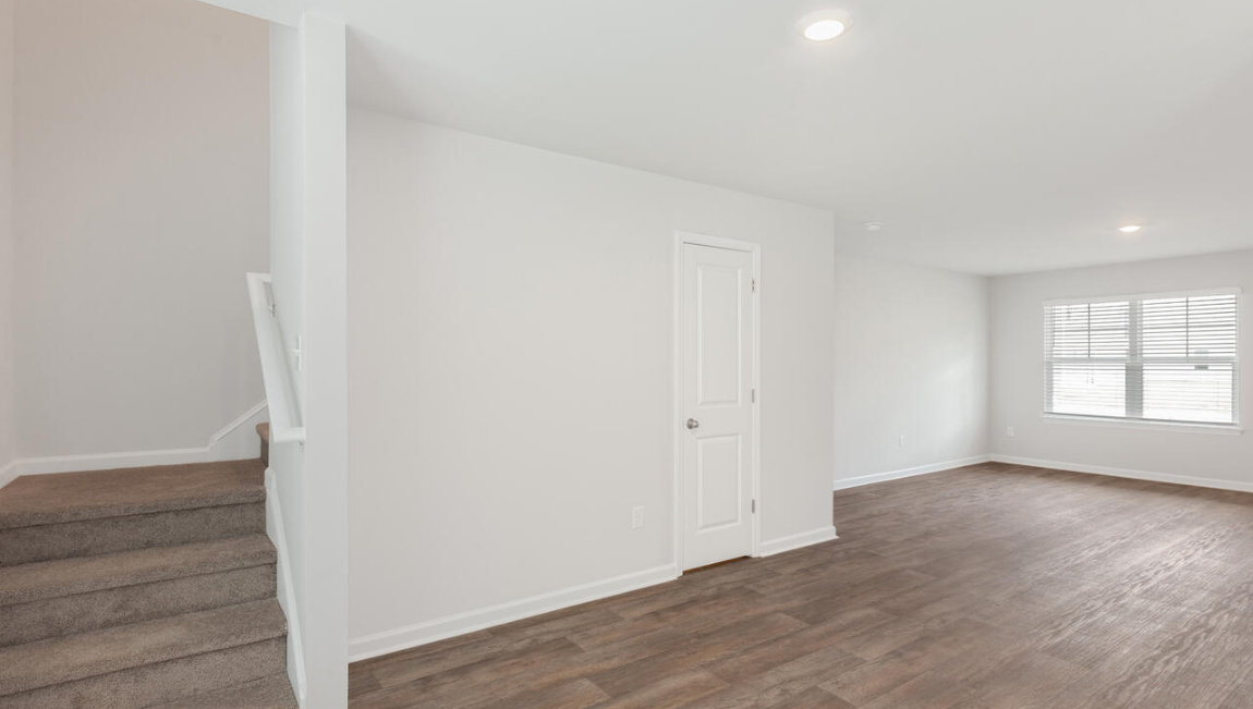 The heart of the home is the kitchen granite counters, a large peninsula island with room for 4 counter height barstools. The stainless-steel appliances, microwave, dishwasher and single bowl sink.