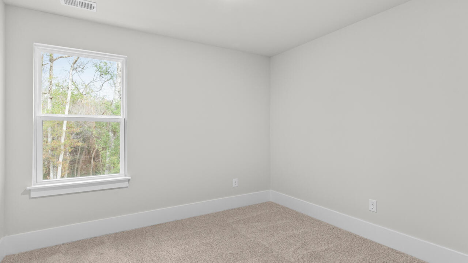 Upstairs, there are an additional 2 bedrooms, bathroom and laundry room.  In every bedroom you’ll have carpeted floors and a closet in each room. Whether these rooms become bedrooms,