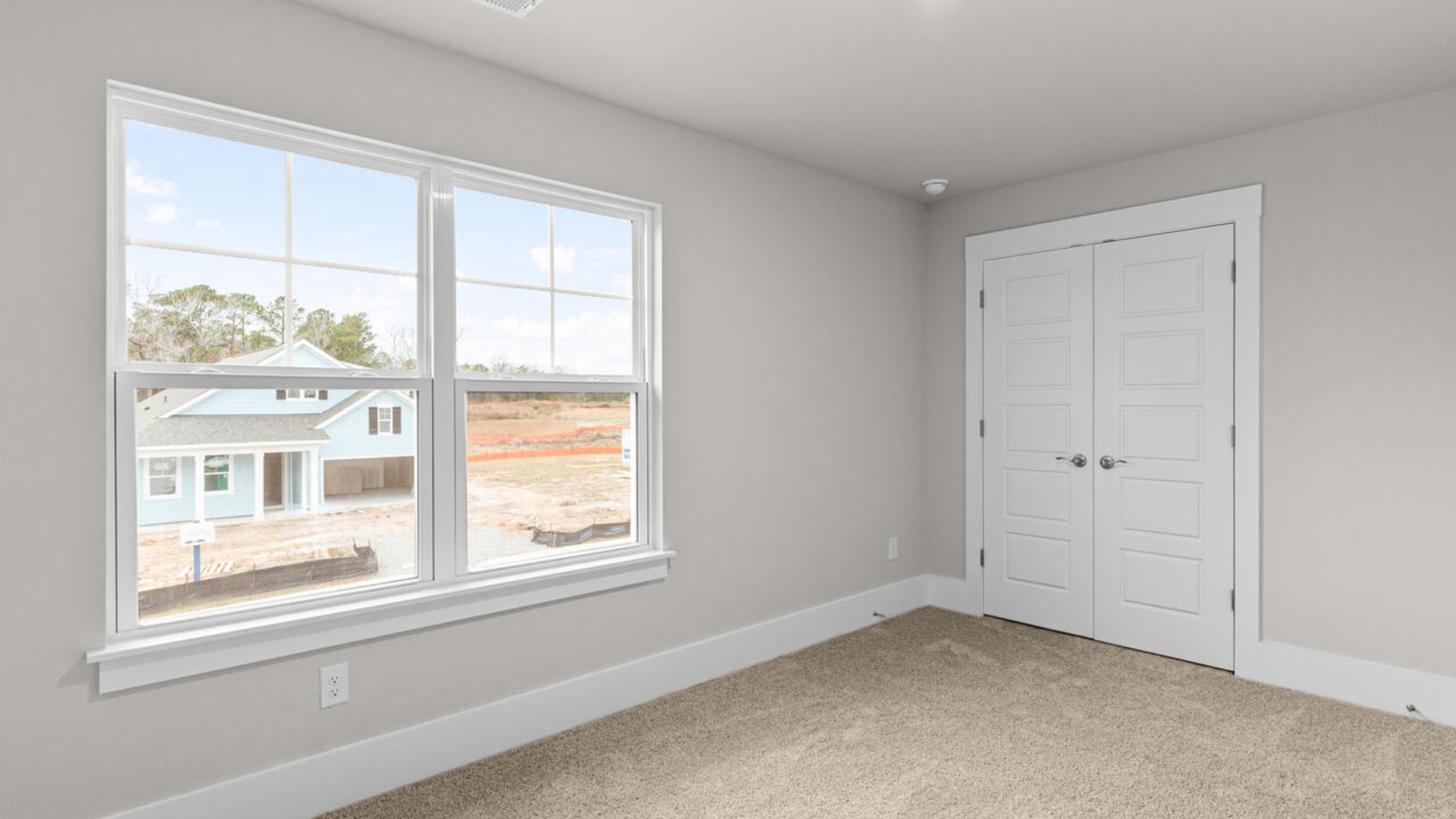 Upstairs, there are an additional 2 bedrooms, bathroom and laundry room.  In every bedroom you’ll have carpeted floors and a closet in each room. Whether these rooms become bedrooms,