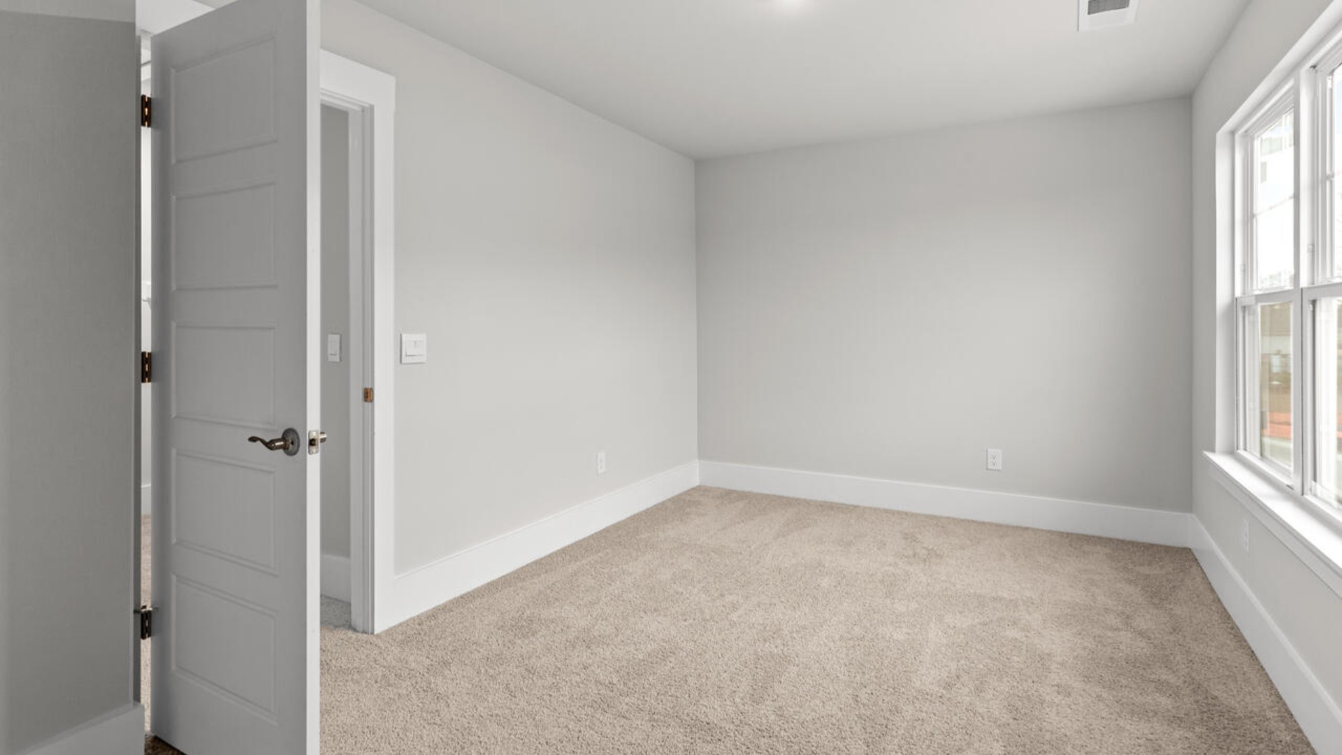 Upstairs, there are an additional 2 bedrooms, bathroom and laundry room.  In every bedroom you’ll have carpeted floors and a closet in each room. Whether these rooms become bedrooms,