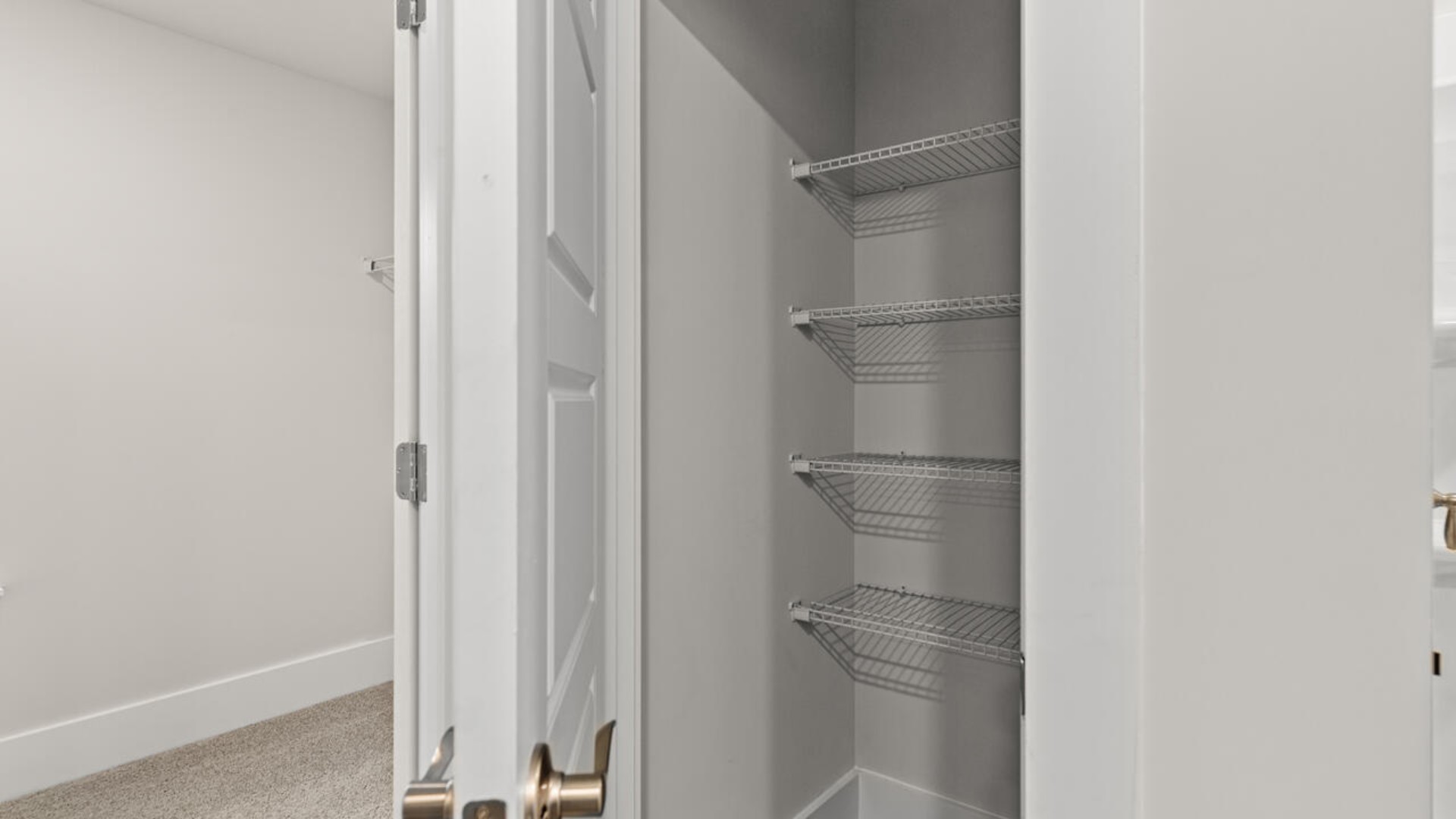 Upstairs, there are an additional 2 bedrooms, bathroom and laundry room.  In every bedroom you’ll have carpeted floors and a closet in each room. Whether these rooms become bedrooms,