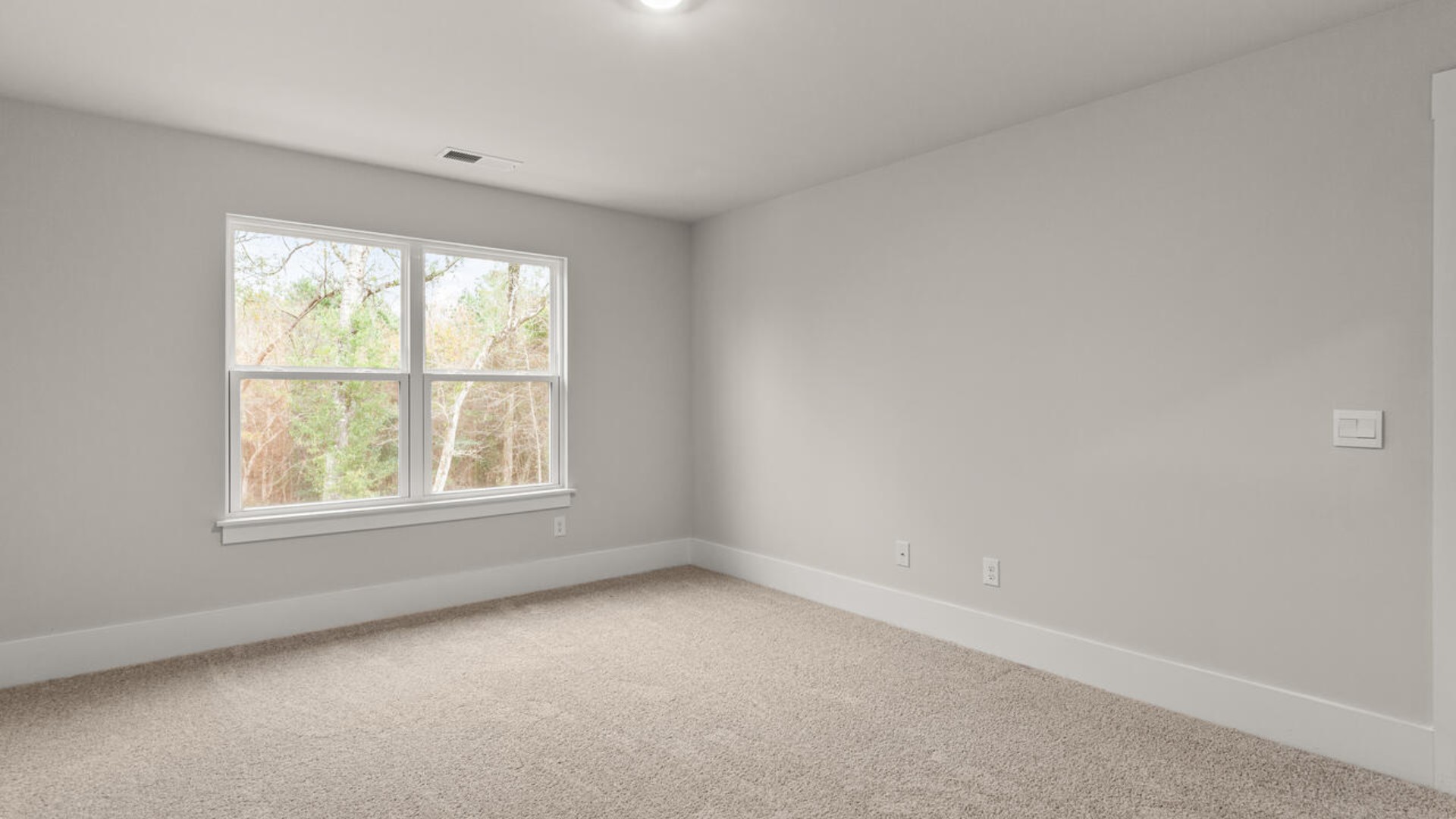 The primary bedroom has its own attached bathroom that features a walk-in closet and all the space you need to get ready in the morning.