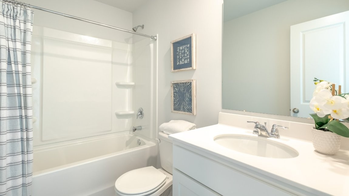 The primary bedroom has its own attached bathroom that features a walk-in closet and all the space you need to get ready in the morning. Sharing a sink isn’t a worry with the double vanity, and you also get additional privacy with a separate door for the toilet and shower.