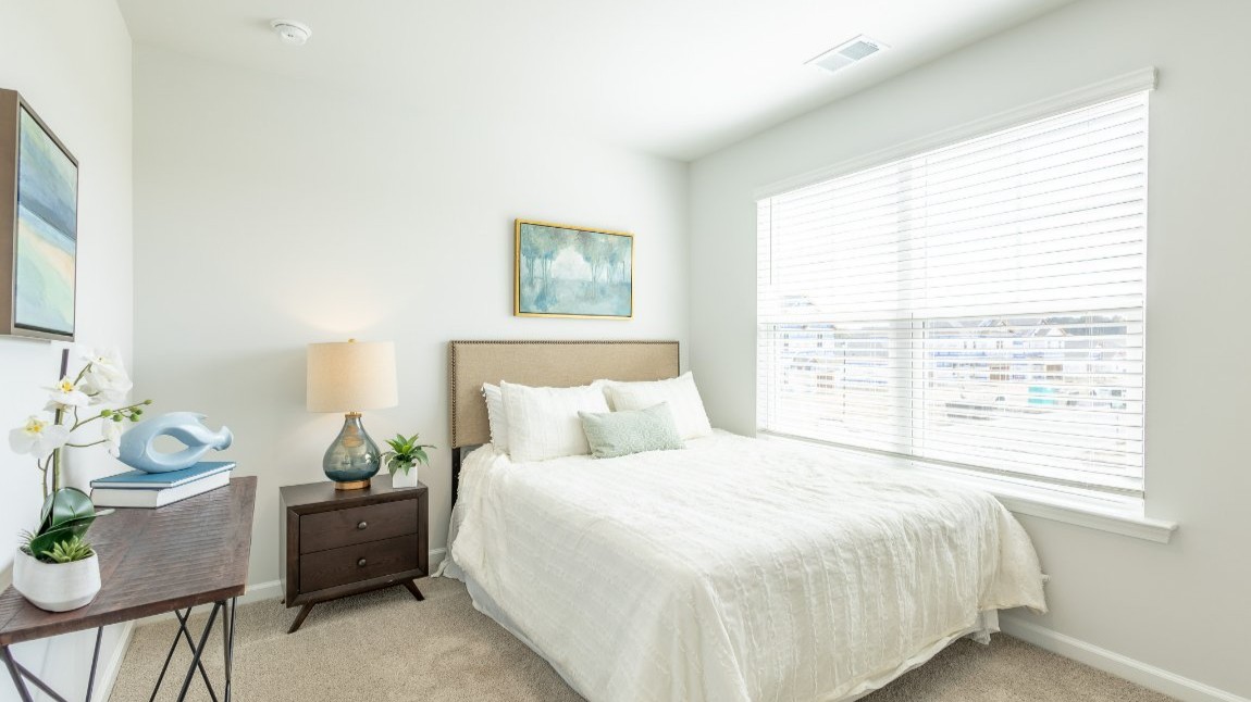 The primary bedroom has its own attached bathroom that features a walk-in closet and all the space you need to get ready in the morning. Sharing a sink isn’t a worry with the double vanity, and you also get additional privacy with a separate door for the toilet and shower.