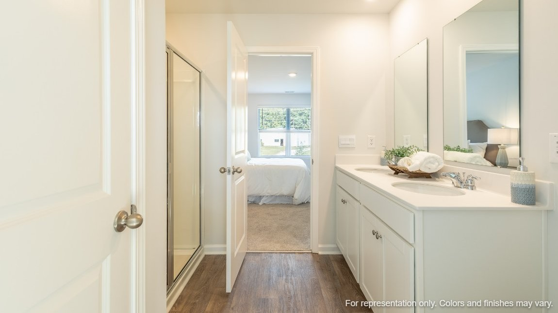 The primary bedroom has its own attached bathroom that features a walk-in closet and all the space you need to get ready in the morning. Sharing a sink isn’t a worry with the double vanity, and you also get additional privacy with a separate door for the toilet and shower.