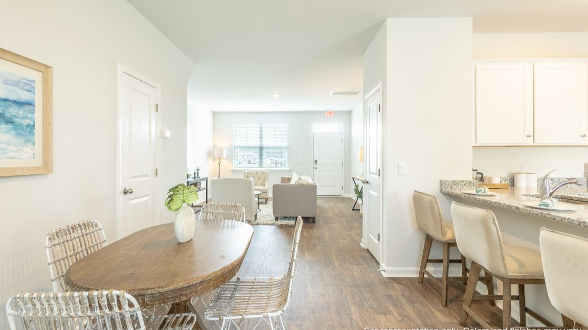 Entering the home we find a large family room and dining area that's perfect for entertaining. The heart of the home is the kitchen granite counters, a large peninsula island with room for 4 counter height barstools. The stainless-steel Whirlpool appliances include a 5-burner gas range, microwave, dishwasher, single-bowl sink and even a refrigerator!