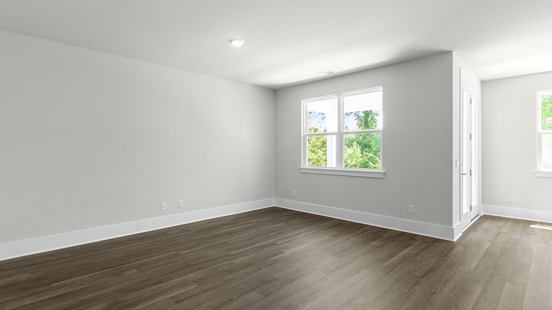 The open-concept kitchen, living, and dining area is perfect for everyday living and entertaining.