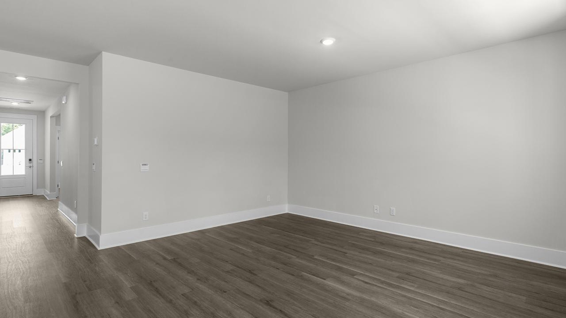 The open-concept kitchen, living, and dining area is perfect for everyday living and entertaining.