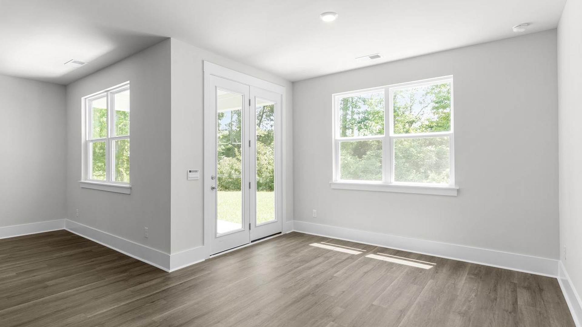 The open-concept kitchen, living, and dining area is perfect for everyday living and entertaining.