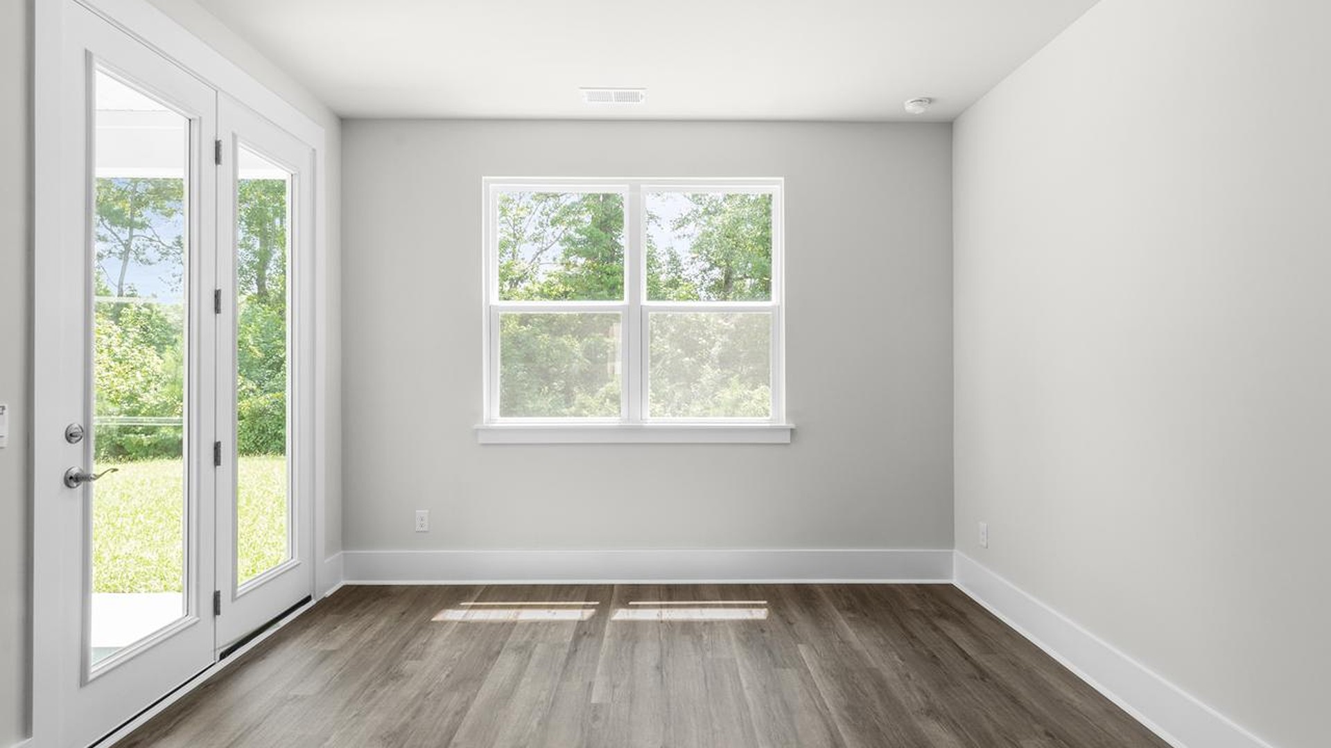 The open-concept kitchen, living, and dining area is perfect for everyday living and entertaining.