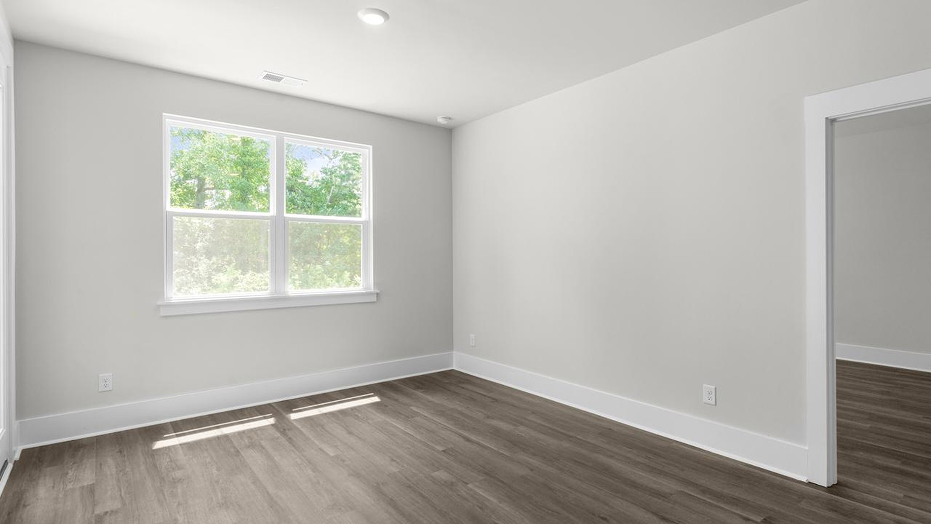 The open-concept kitchen, living, and dining area is perfect for everyday living and entertaining.