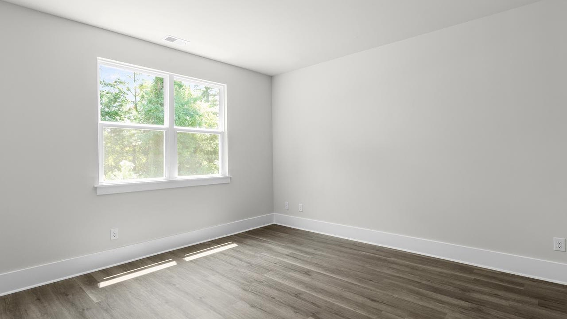 The downstairs primary suite includes a walk-in-closet and ensuite bath with a double vanity, walk-in-shower, and separate water closet. The guest ensuite upstairs provides tons of privacy and LVP flooring throughout the main level makes cleanups a breeze