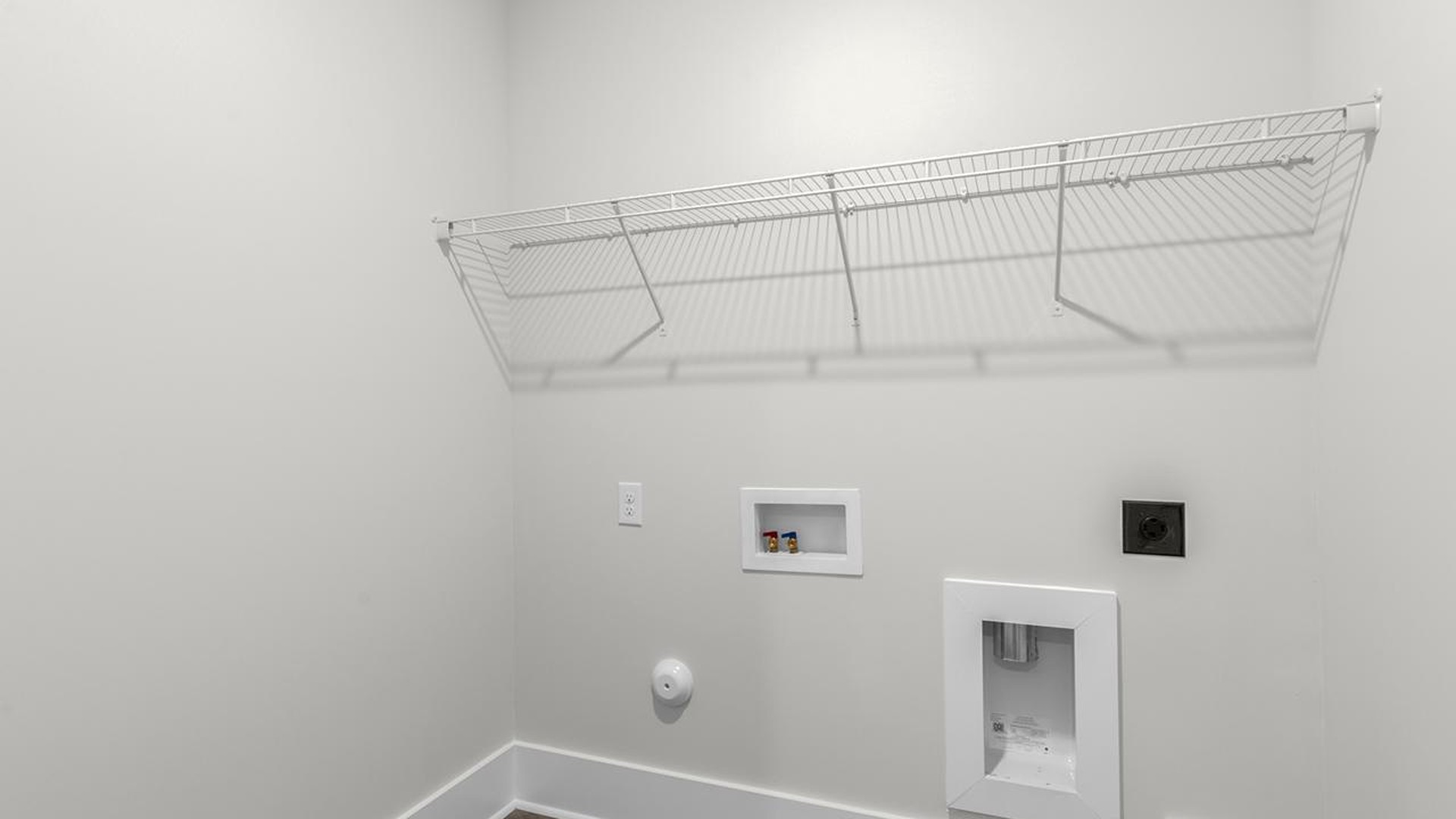 As you make your way off the front porch, a foyer leads you into the heart of the home. Two bedrooms sit off the main foyer and share a full bathroom in the middle