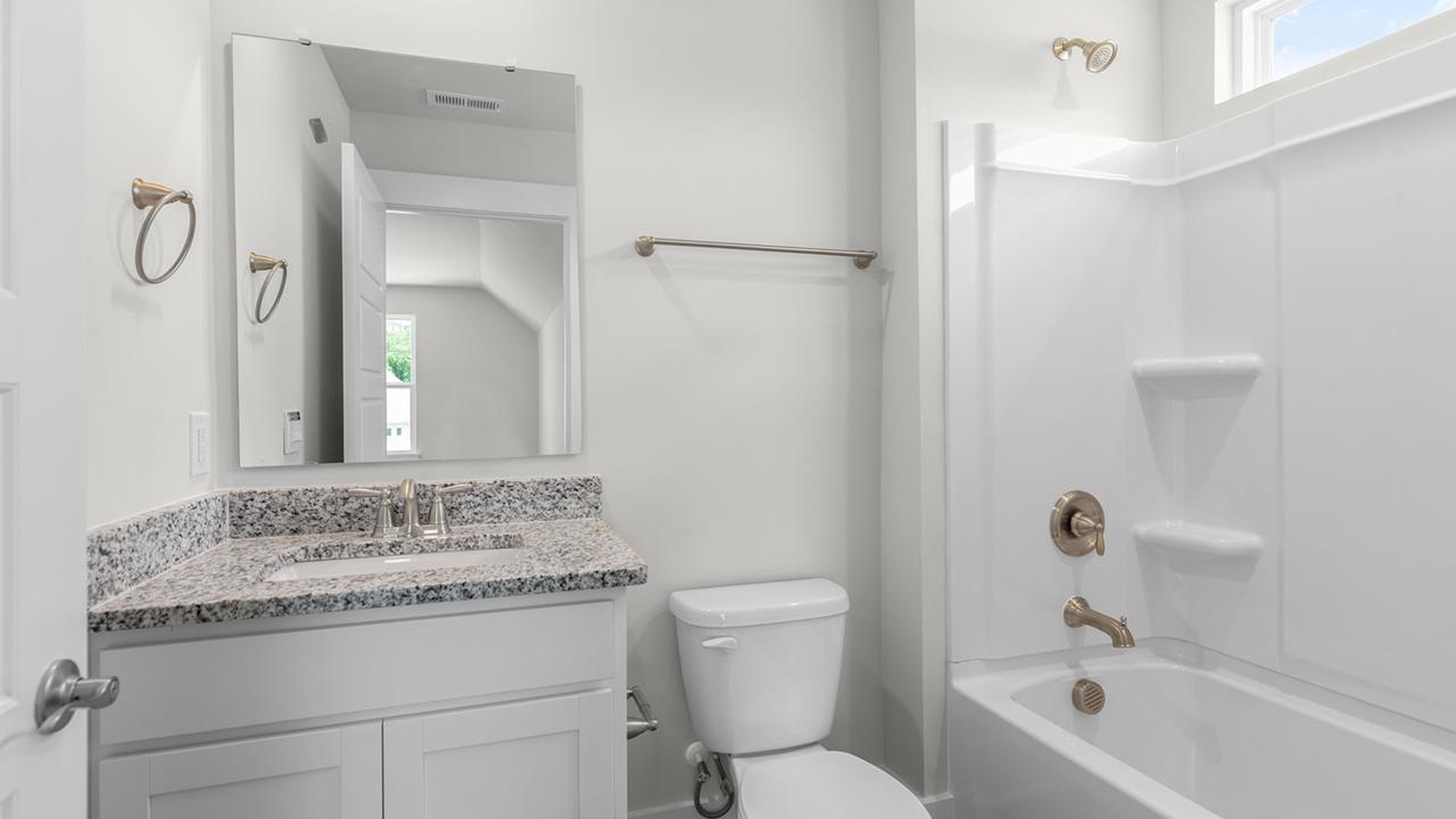 The guest ensuite upstairs provides tons of privacy and LVP flooring throughout the main level makes cleanups a breeze!