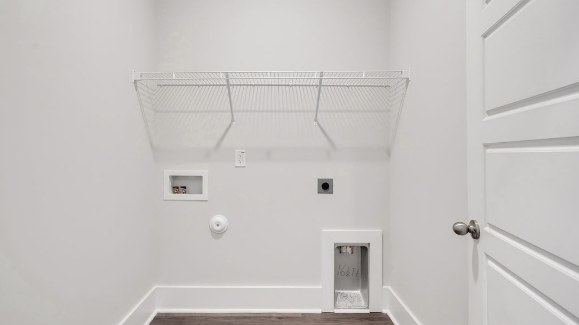 As you make your way off the front porch, a foyer leads you into the heart of the home. Two bedrooms sit off the main foyer and share a full bathroom in the middle.