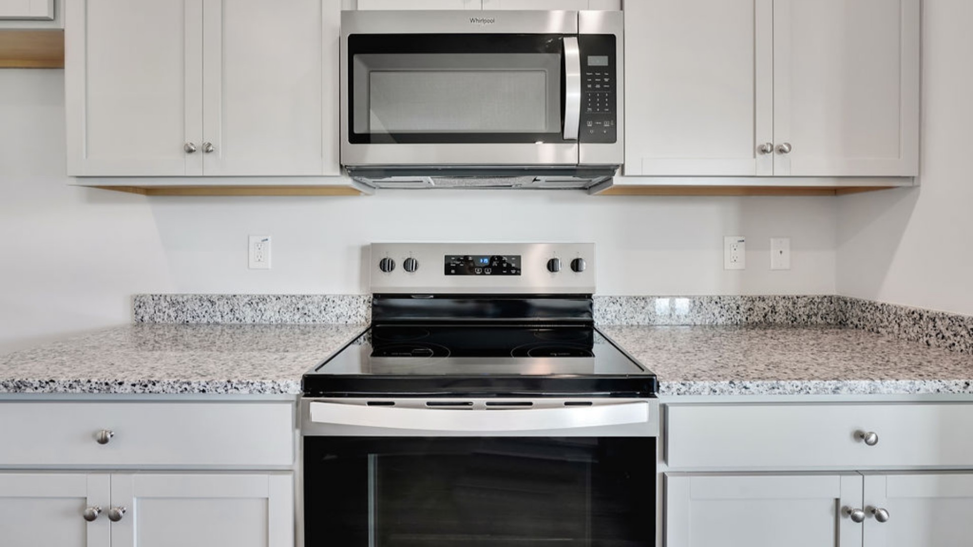 The main living area does not disappoint, by offering plenty of room to gather with family and friends in front of the corner fireplace. The updated kitchen includes a walk-in pantry, stainless-steel appliances, and a large island for bar seating.