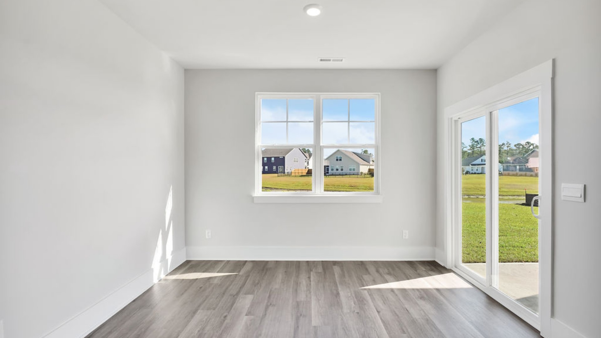 The main living area does not disappoint, by offering plenty of room to gather with family and friends in front of the corner fireplace. The updated kitchen includes a walk-in pantry, stainless-steel appliances, and a large island for bar seating.