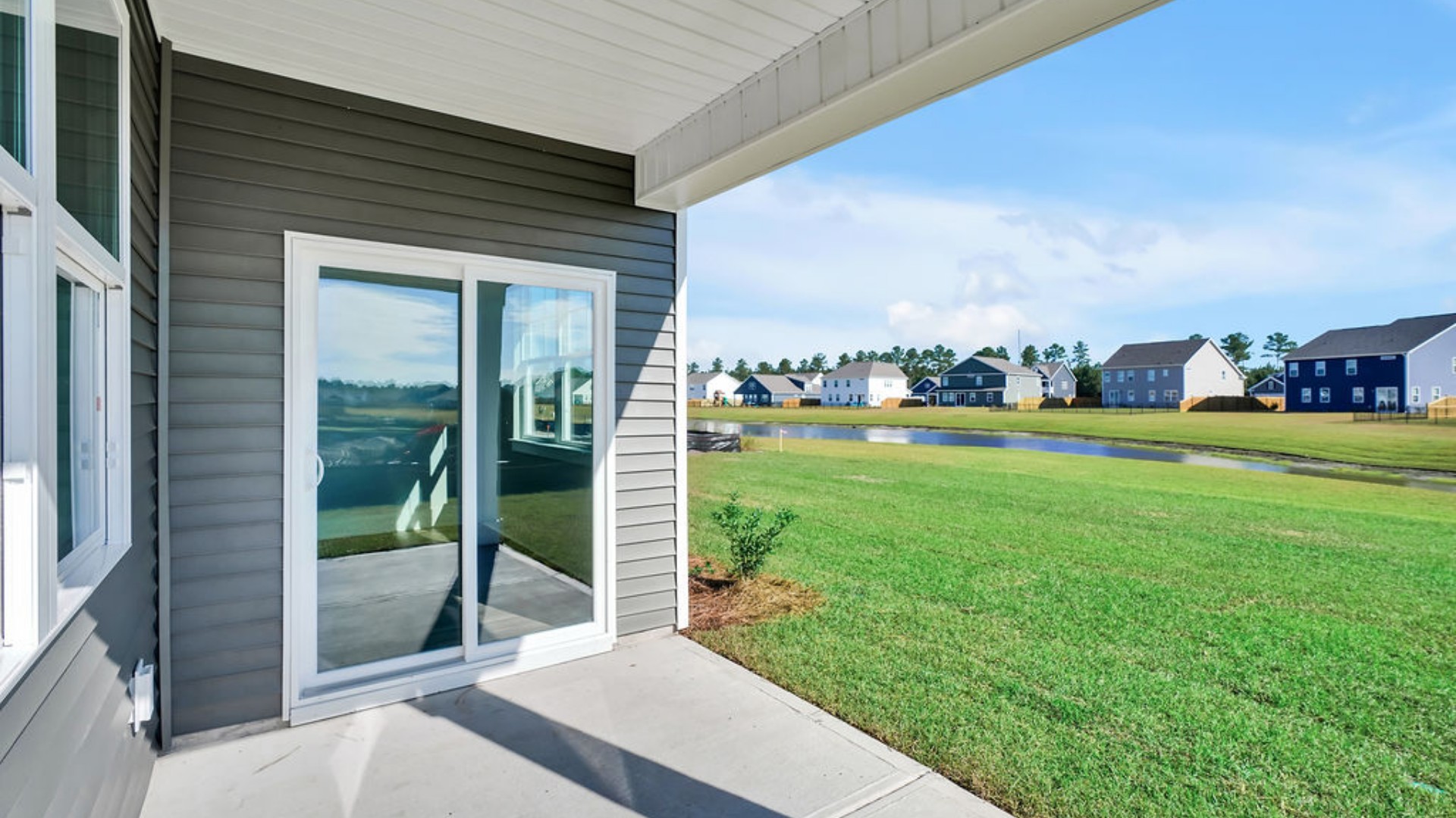 Enjoy a meal with family and friends in the dining area that allows access to the covered back porch.