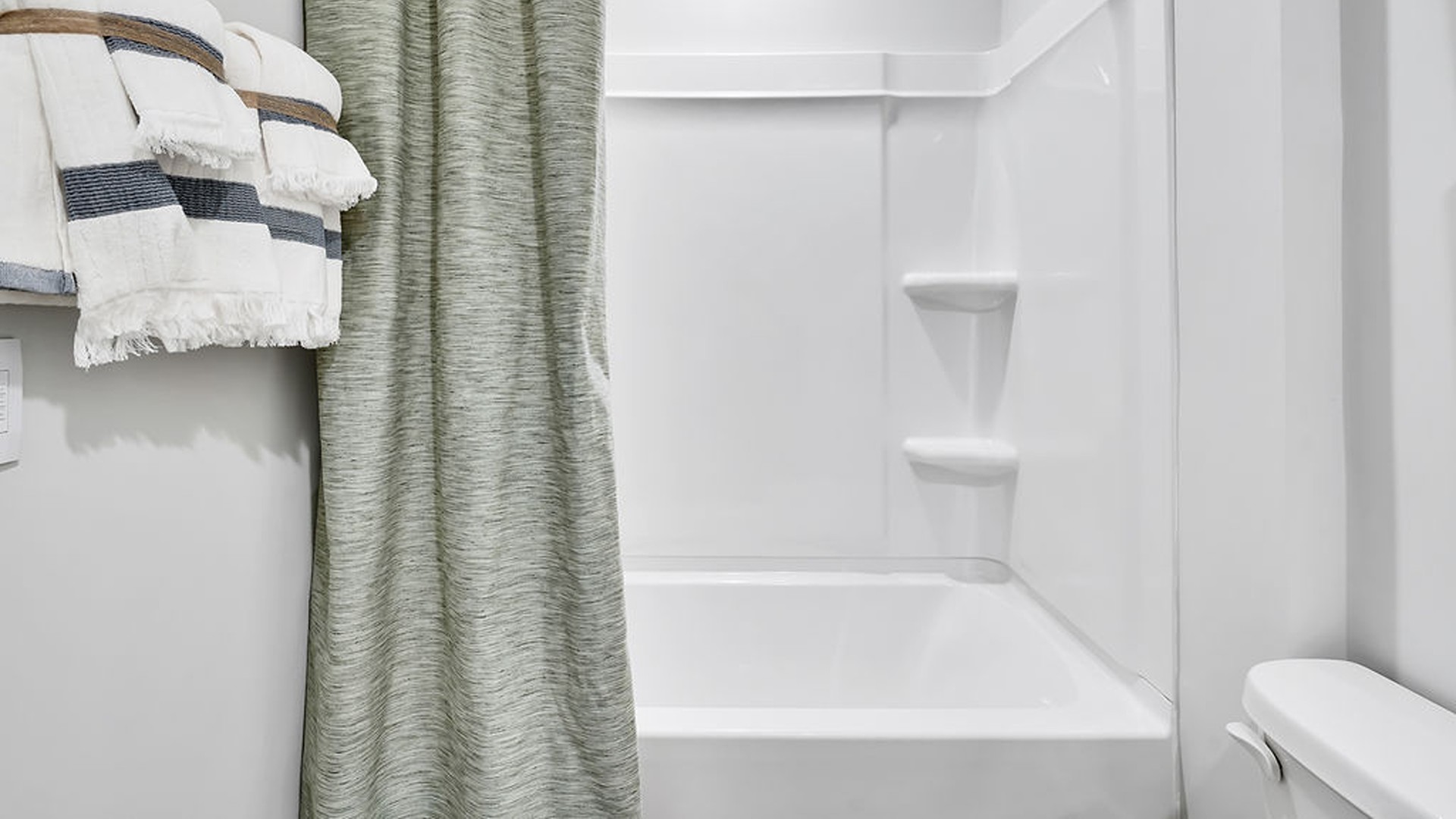 The second floor features a 3rd bedroom and 3rd full bathroom plus additional living space.