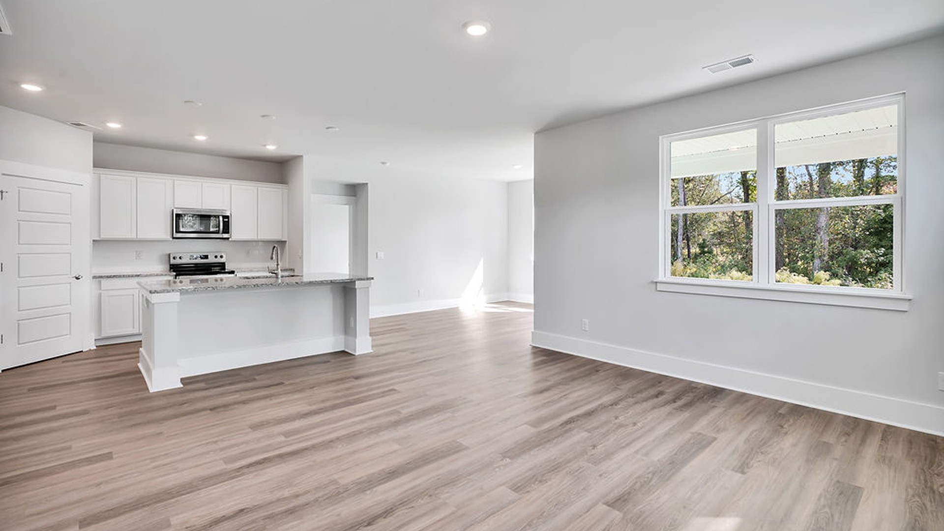 The Bradford is a versatile plan with an open concept kitchen, living, and dining area!