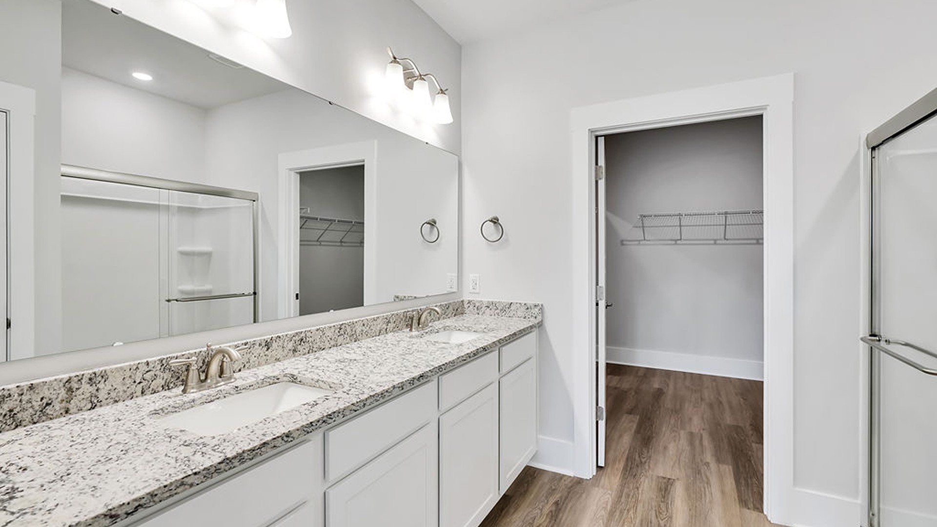 The Bradford is a versatile plan with an open concept kitchen, living, and dining area! The kitchen comes finished with beautiful granite countertops, stainless steel appliances, single-bowl sink and tile backsplash