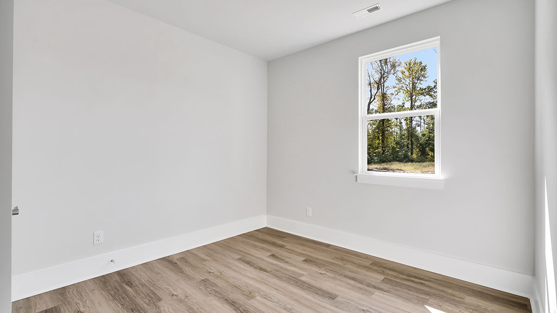 Also enjoy a split bedroom layout with he remaining two bedrooms can be found towards the front of the home. In every bedroom you’ll have carpeted floors and a closet in each room. Whether these rooms become bedrooms, office spaces, or other bonus rooms, there is sure to be comfort.