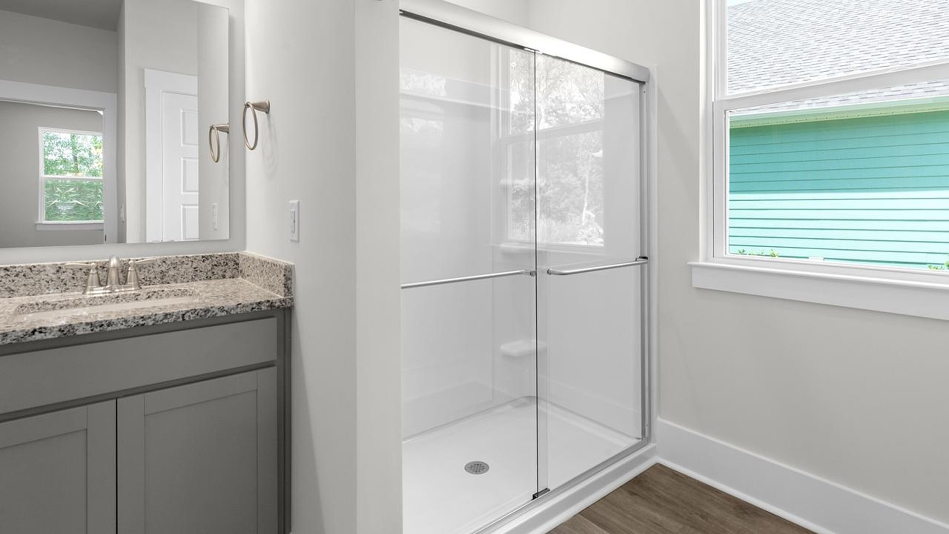The primary suite serves as a peaceful retreat, featuring an en-suite bathroom with dual vanities and a walk-in closet. The additional bedrooms provide comfort and privacy and share access to a secondary bathroom.The primary suite serves as a peaceful retreat, featuring an en-suite bathroom with dual vanities and a walk-in closet. The additional bedrooms provide comfort and privacy and share access to a secondary bathroom.