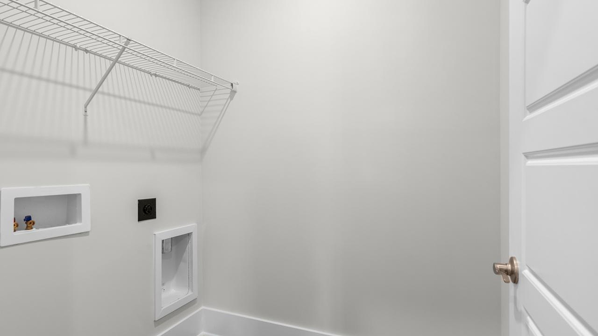 The primary suite serves as a peaceful retreat, featuring an en-suite bathroom with dual vanities and a walk-in closet. The additional bedrooms provide comfort and privacy and share access to a secondary bathroom.