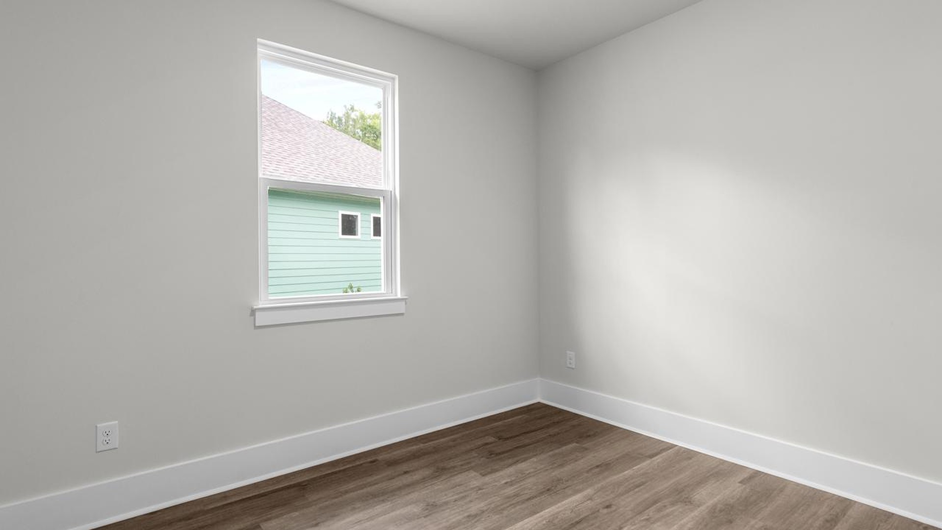 The primary suite serves as a peaceful retreat, featuring an en-suite bathroom with dual vanities and a walk-in closet. The additional bedrooms provide comfort and privacy and share access to a secondary bathroom.