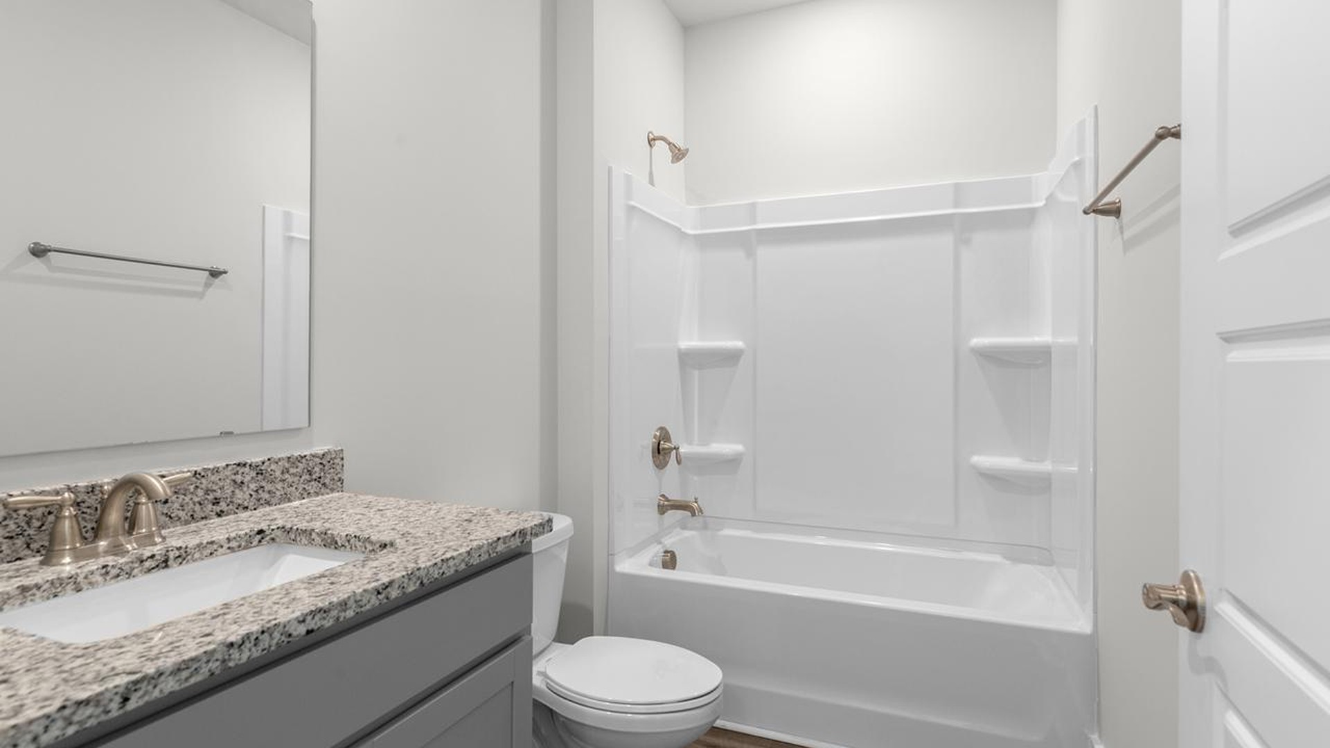 The primary suite serves as a peaceful retreat, featuring an en-suite bathroom with dual vanities and a walk-in closet. The additional bedrooms provide comfort and privacy and share access to a secondary bathroom.The primary suite serves as a peaceful retreat, featuring an en-suite bathroom with dual vanities and a walk-in closet. The additional bedrooms provide comfort and privacy and share access to a secondary bathroom.