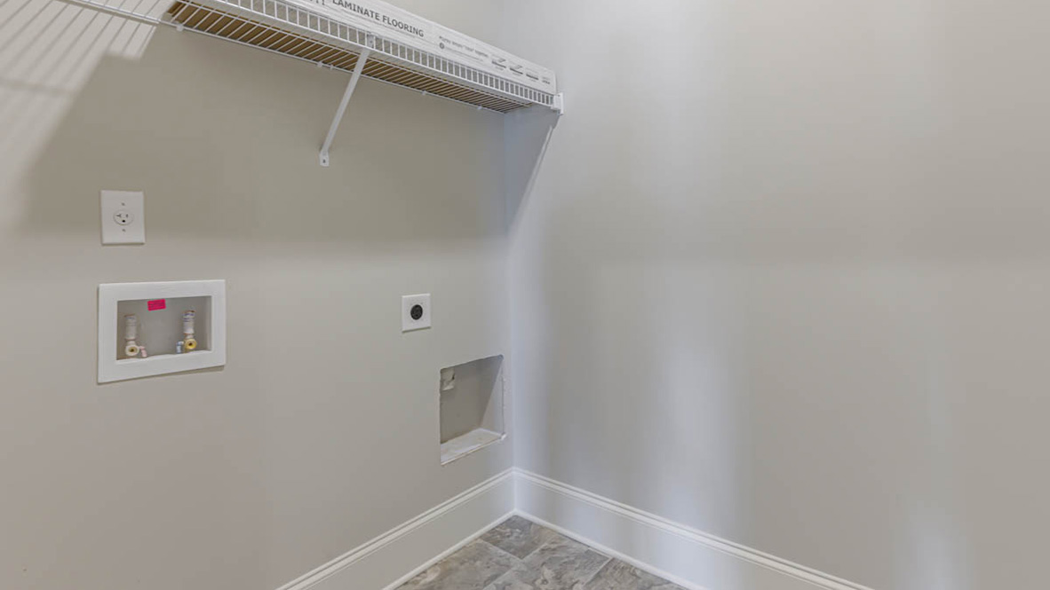 The additional bedrooms provide comfort and privacy and share access to a secondary bathroom.