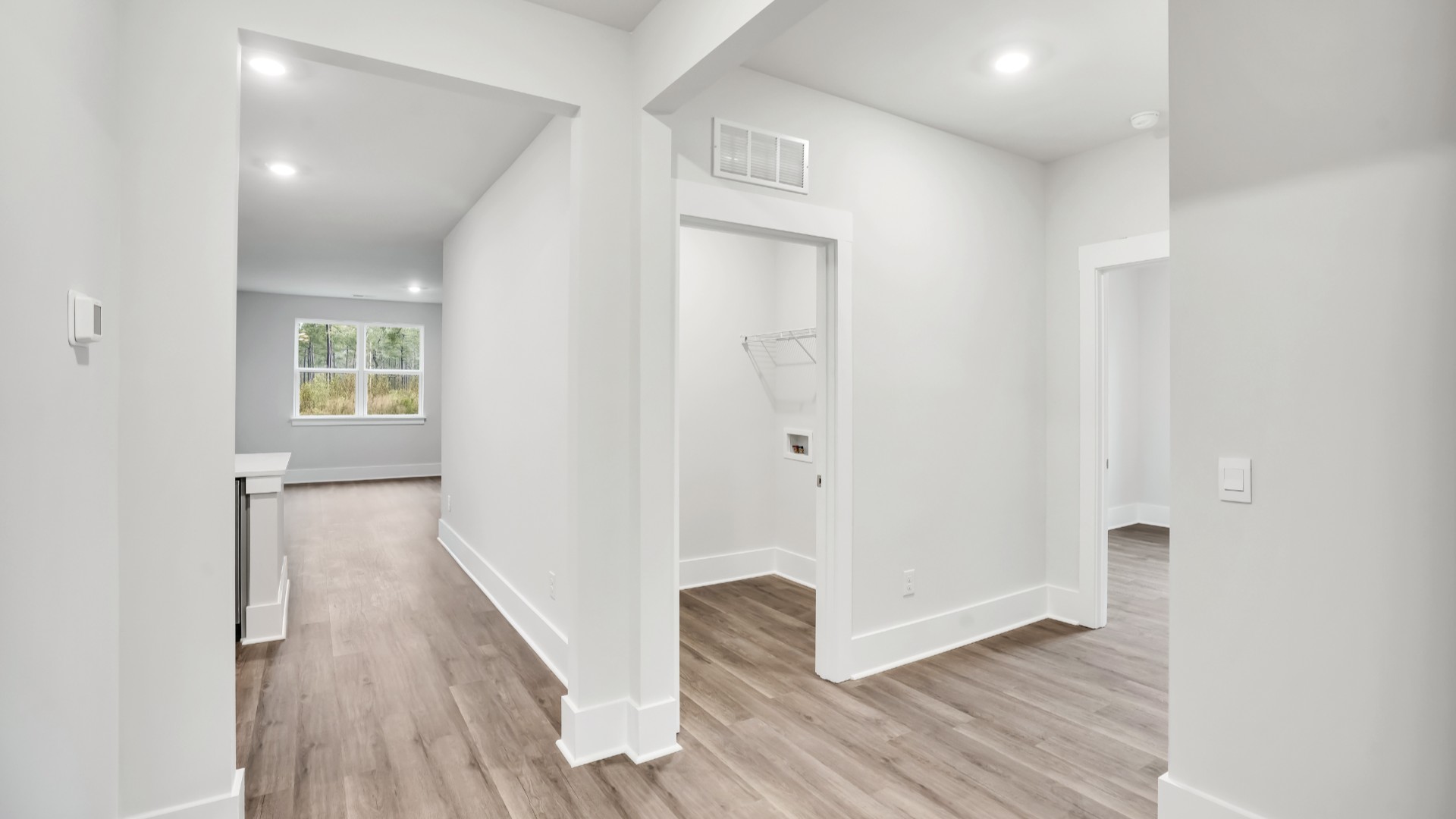 The additional bedrooms provide comfort and privacy and share access to a secondary bathroom.