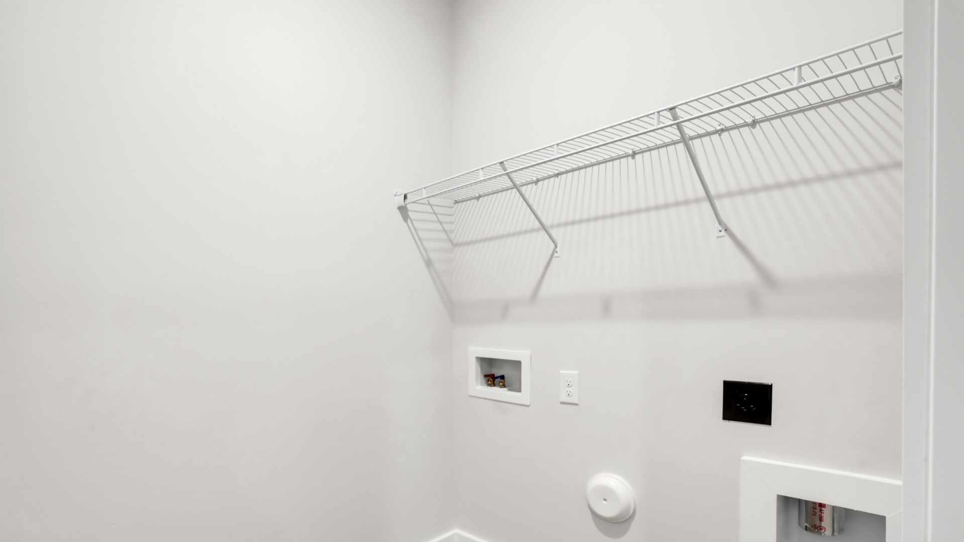 The additional bedrooms provide comfort and privacy and share access to a secondary bathroom.