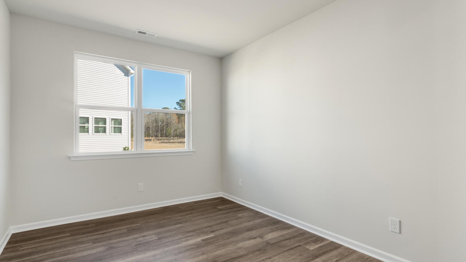 The Darby Plan in Rolling Hill, located in Bolivia, North Carolina a beautiful home is 1881 sq ft with 3 bedrooms, a study, 2 full baths on the main level, a back porch, and a two-car garage.