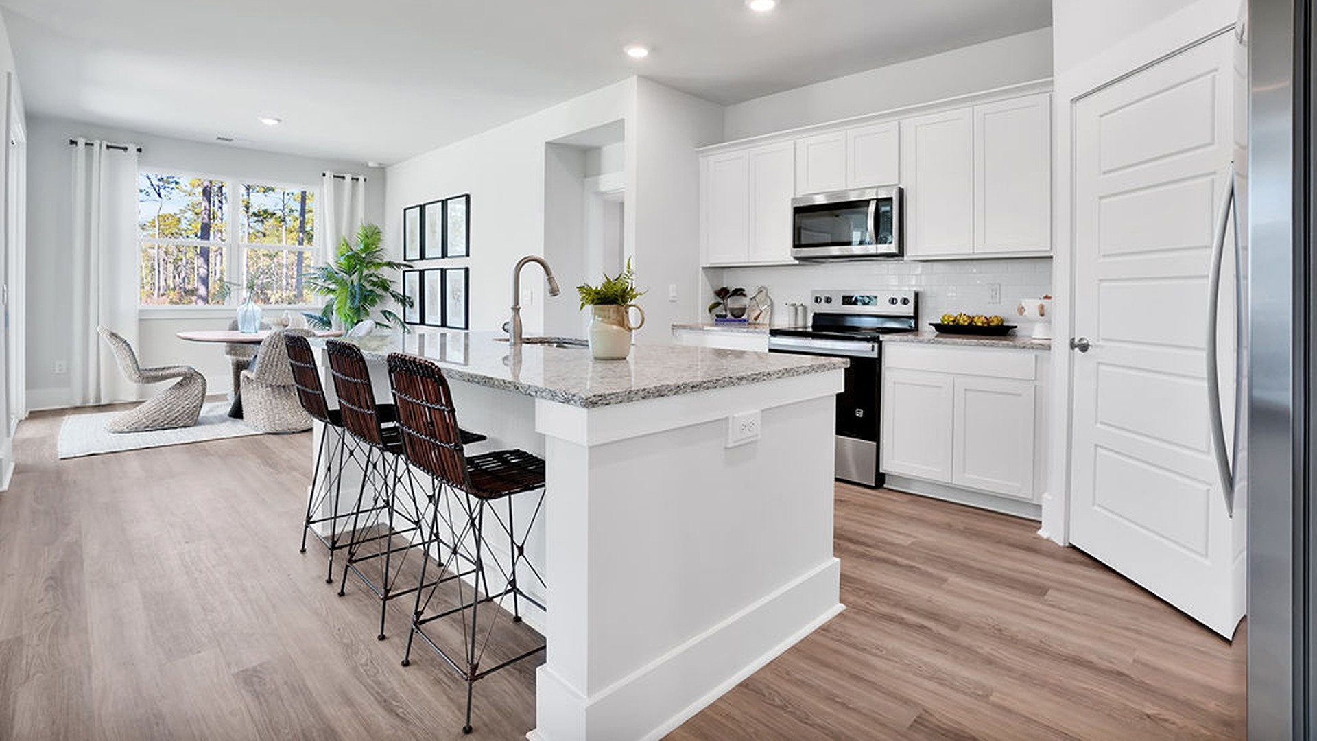 The Bradford is a versatile plan with an open concept kitchen, living, and dining area! The kitchen comes finished with beautiful granite countertops, stainless steel appliances, single-bowl sink and tile backsplash. You’ll never be too far from the action with the living and dining area right there.