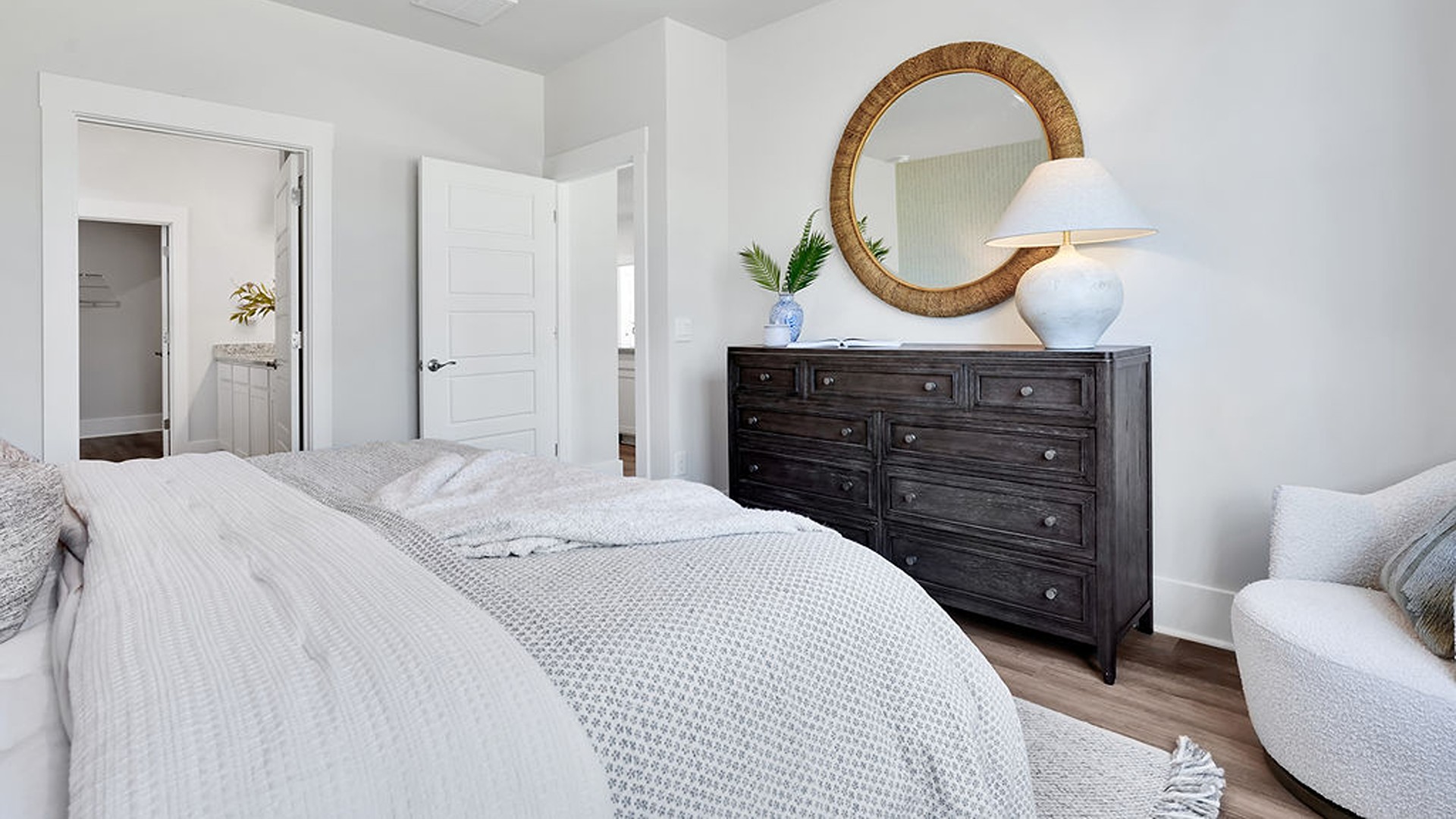 The primary bedroom has its own attached bathroom that features a walk-in closet and all the space you need to get ready in the morning. Sharing a sink isn’t a worry with the double vanity, and you also get additional privacy with a separate door for the toilet and shower.