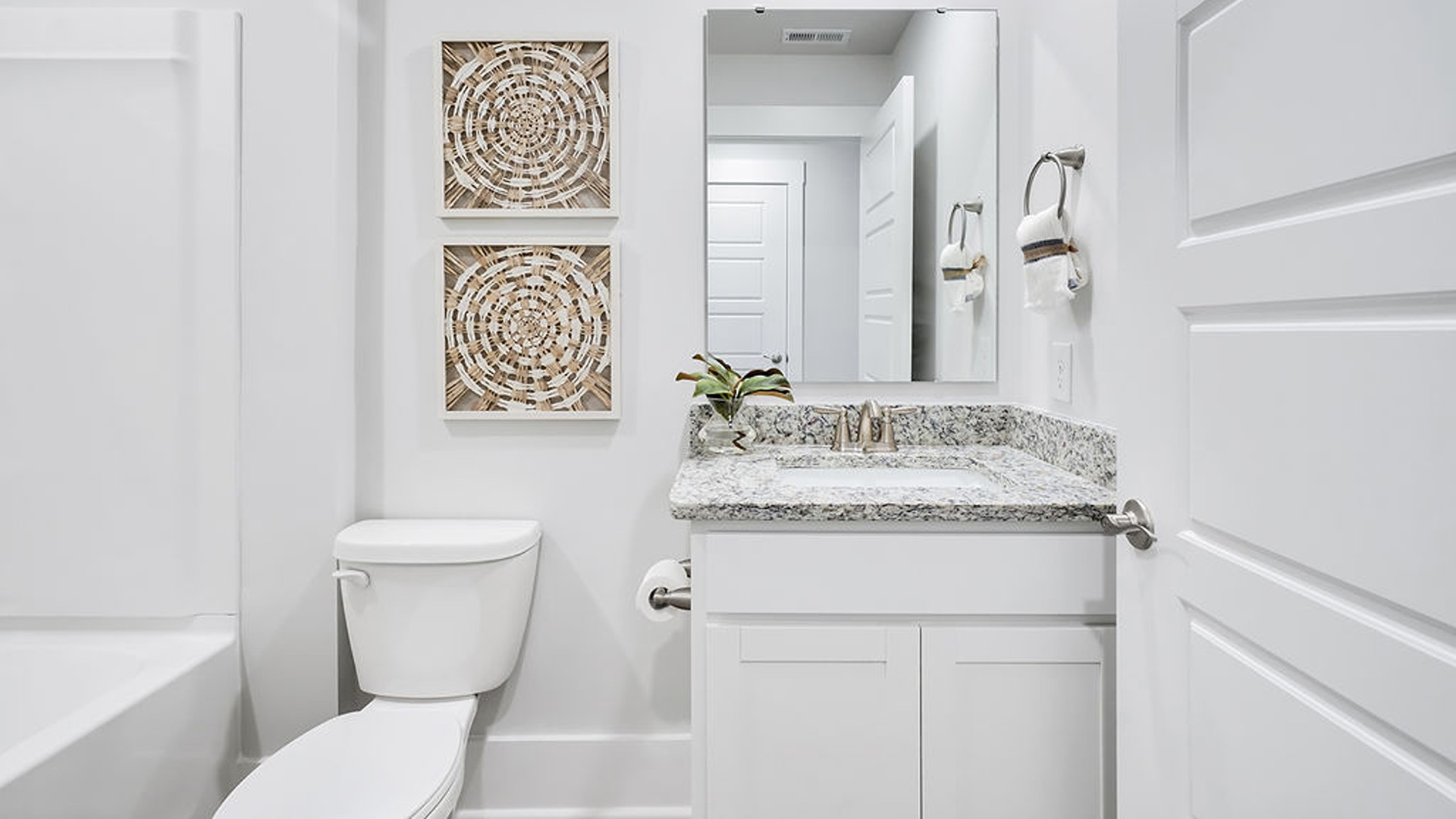 The primary bedroom has its own attached bathroom that features a walk-in closet and all the space you need to get ready in the morning. Sharing a sink isn’t a worry with the double vanity, and you also get additional privacy with a separate door for the toilet and shower.