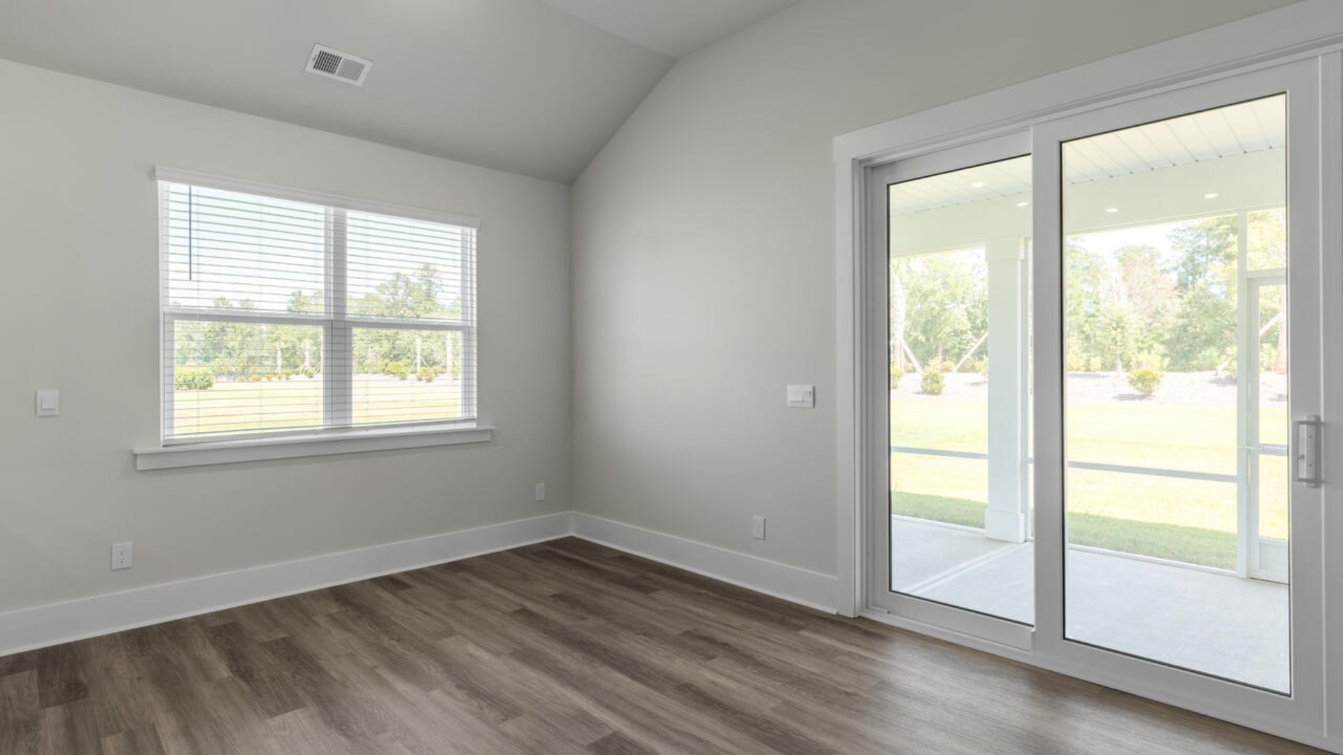 Open concept design with plenty of room for everyone to gather around the huge kitchen island.