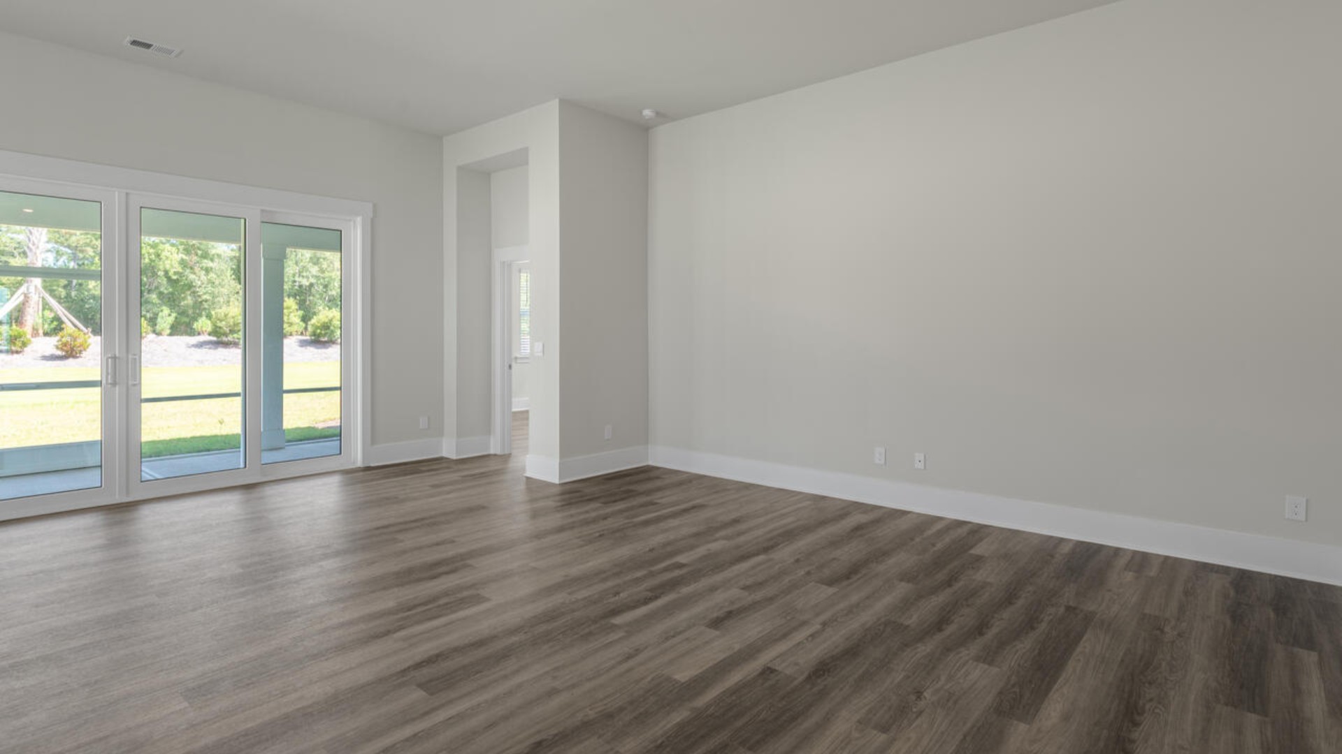 Open concept design with plenty of room for everyone to gather around the huge kitchen island.
